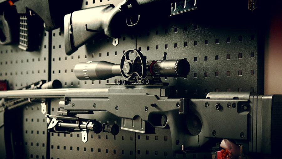 What are the "ticks" and "numbers" in a sniper scope for?