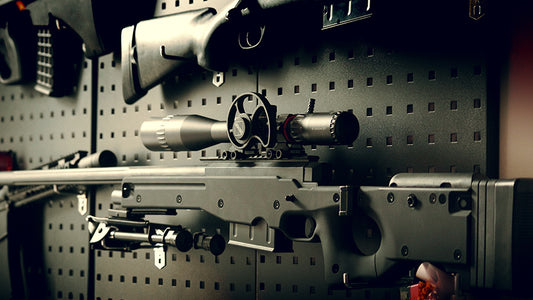 What are the "ticks" and "numbers" in a sniper scope for?